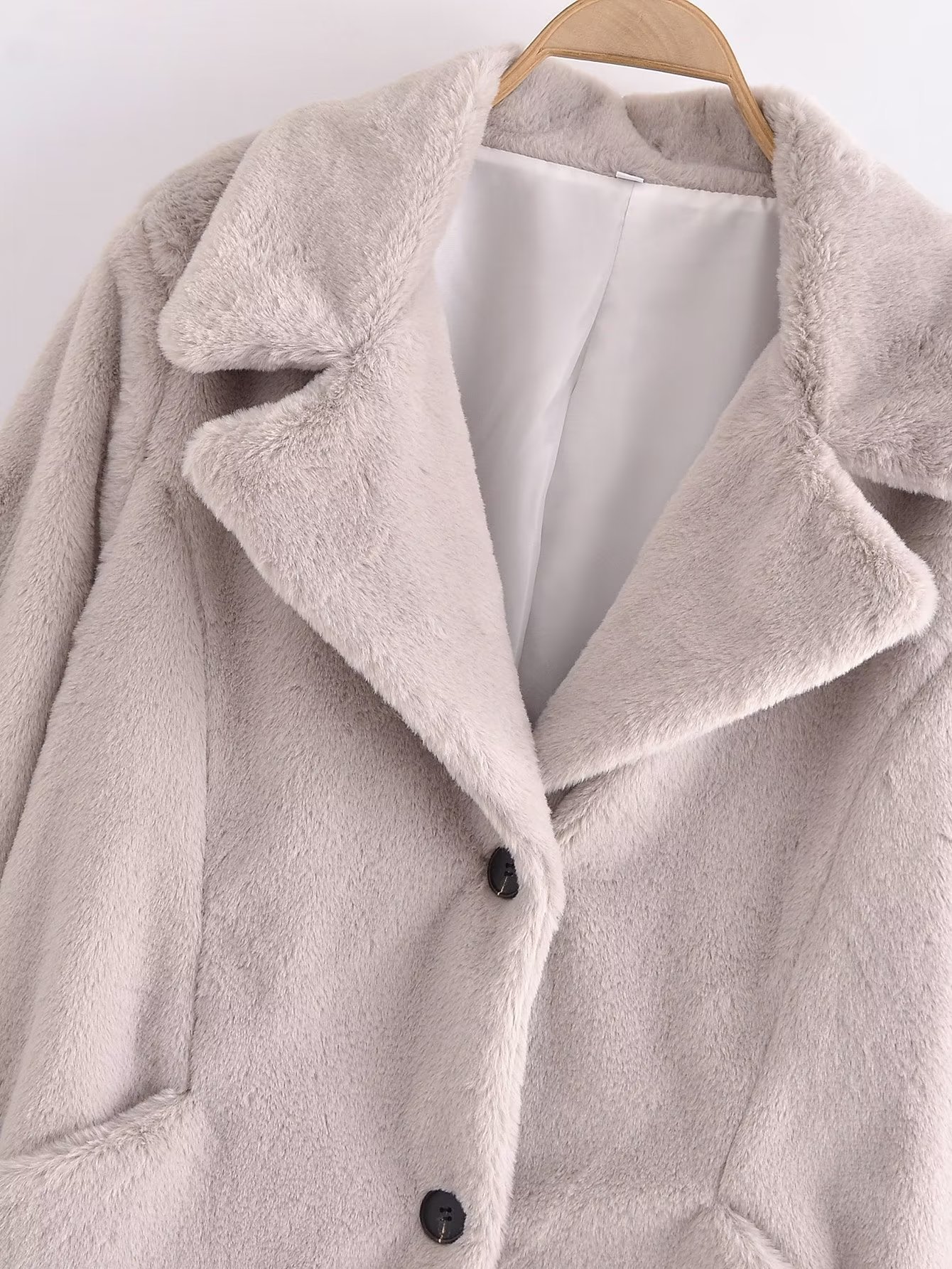 Solid Color Pockets Two Buttons In The Long Thick Jacket
